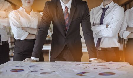 Business spends time planning a new financial project with team brainstorming while sitting at the...