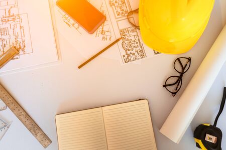 Construction site engineer. Engineering objects on workplace の写真素材
