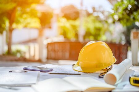 Construction site engineer. Engineering objects on workplace の写真素材