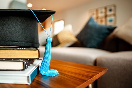 Graduation cap on Books step.の写真素材
