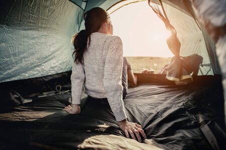 Women lie in tents.at camp. 
の写真素材