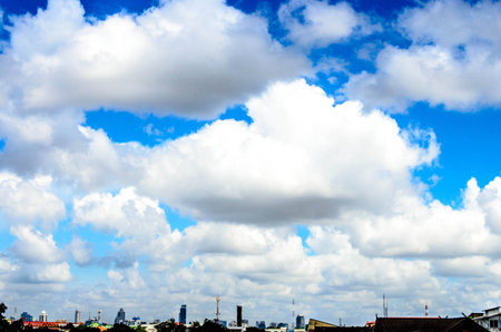 White clouds in a blue sky  bangkok thailandの写真素材
