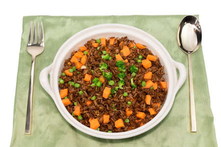 vegetable fried rice with broccoli carrot bean in bowl isolated on white background close up have spoon, top view, copy space, food and drink concept.の写真素材