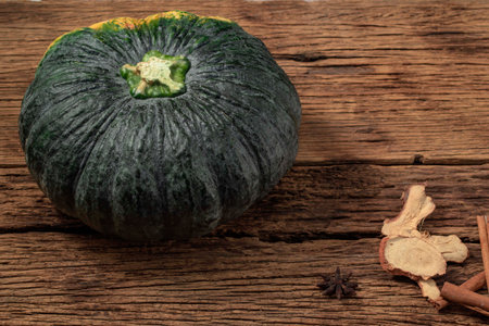 Pumpkin spice cinnamon on wood background, top view, healthy food concept.の写真素材