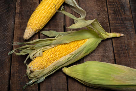 Dry sweetcorn on wood background, food healthy concept.