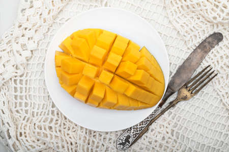 Mango fruit yellow isolated on white background, top view, healthy food concept.