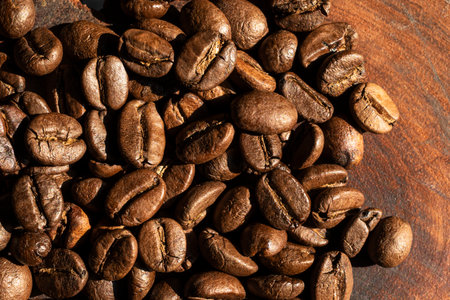 Roasted coffee bean close up, top view, food and drink concept.
