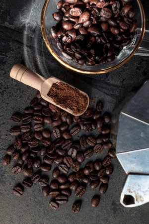 Roasted coffee bean on stone background copy space, top view, food and drink concept.の写真素材