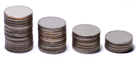 Stack of coins on a white background, Silver and gold coins on white background, Row of stack of coin with copy space for create your text, Saving, Investment money conceptの写真素材