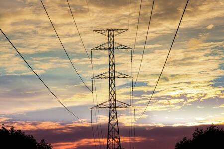 Electricity pole with silhouette sunset sky, Electricity pylon with shadow of tree in dawn time,...