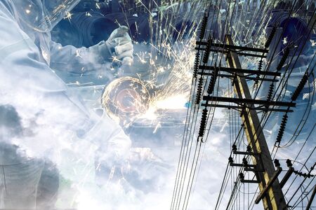 Electricity pole against blue sky clouds, Transmission line of electricity to rural, High voltage electricity pole on bright sky clouds background, electricity transmission pylonの写真素材