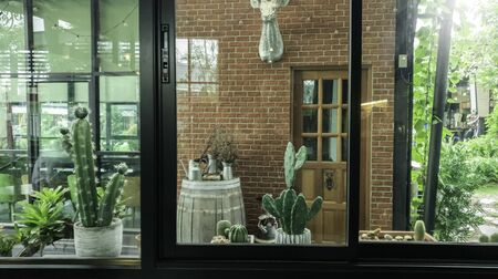 Green nature beside the window, coffee bar, peaceful place for take a rest in the morning, Flare...