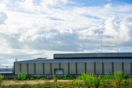 Modern factory building with sunrise sky, Industrial factory background