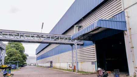 Industrial manufacturing factory with blue sky