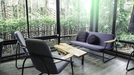 Modern interior chair and table in cafe restaurent, Quiet and chill cafe shop in vintage tone