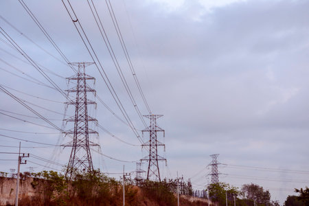 Electricity pole with dark sky before sunrise, Transmission line of electricity to rural,...
