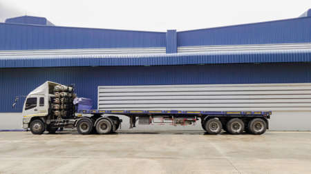 Truck park at warehouse for loading hub goods at factory
