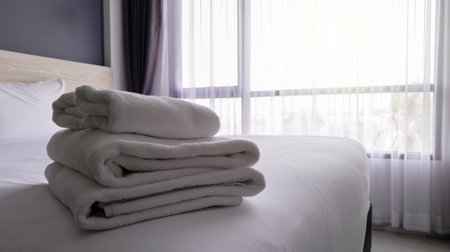 Towels preparing for guest in hotem room, Compact hotel room with facility accommodationの写真素材