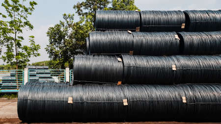 Stacked of high carbon wire rod for heavy industry production,Pile of metal steel wire roll for construction site, concrete usage and building constructionの写真素材