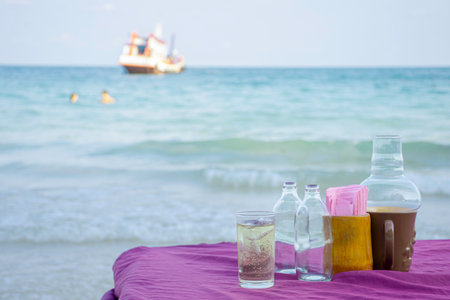 Dining setup table with a stunning sea beach viewの写真素材