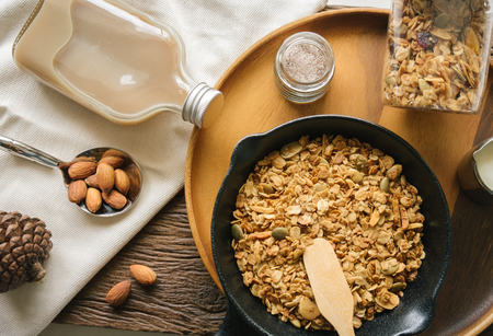 Fresh and Healthy breakfast with the grain and yogurt on the black pan close up shoot. minimal japanese styleの写真素材