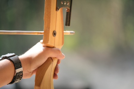 close up of Asian Male Soldier training with the arror and bowの写真素材