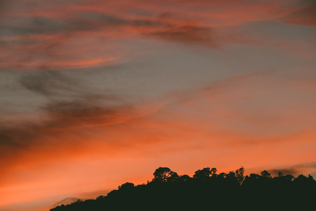 Backlight Silhouette Mountain at Sunsetの写真素材