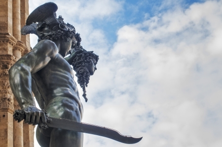 Perseus with the Head of Medusa, bronze statue made by Benvenuto Cellini in 1554 and exposed in Piazza della Signoria, Florence, Italyの写真素材