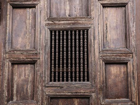 Wooden walls of the church at Wat Phan-Tao temple in Chiang mai,Thailandの写真素材