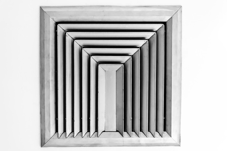 Metal ventilation grid on white background の写真素材