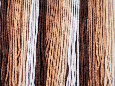 Gradient brown rope hanging for a background の写真素材