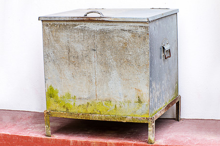 Vintage ice chest at side white wallの写真素材