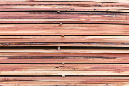 Stack of new wooden  at the lumber yardの写真素材