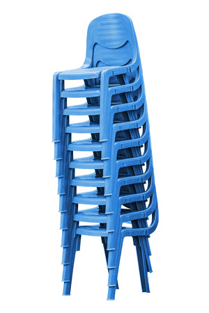 Stack of blue plastic chairs on whiteの写真素材