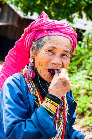 CHIANG MAI,THAILAND - OCTOBER 4 ; Portrait of an old Karen tribe woman, Thai ethnicity, poses for camera at Baan Sa Ngin, Omkoi on October 4,2009 in Chiang mai,Thailand のeditorial素材