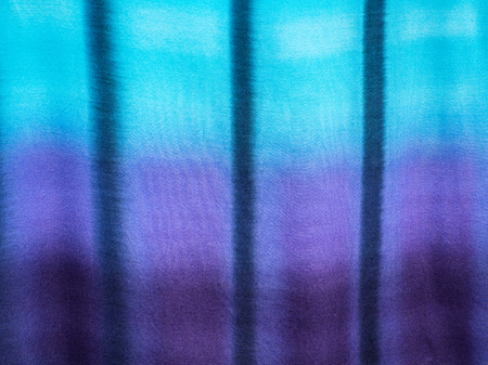 Colorful texture tie dyed fabric for a background 