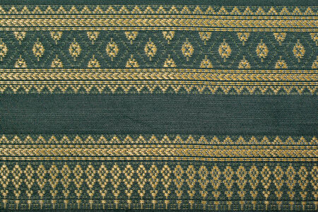 Traditional thai sarong pattern for a background.の写真素材
