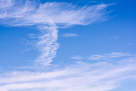 White clouds against blue sky for a background.の写真素材