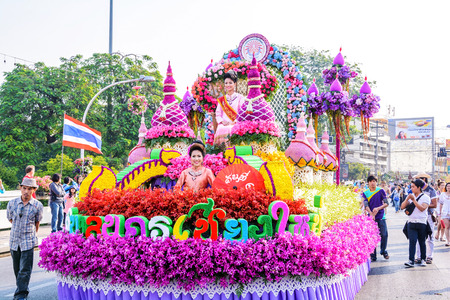 CHIANG MAI,THAILAND-FEBRUARY 07 :Unidentified peoples are in parade with fresh flowers decorate car in annual 39th Chiang Mai Flower Festival,  on February 07, 2015 in Chiang Mai,Thailand.のeditorial素材