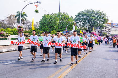 CHIANG MAI,THAILAND-FEBRUARY 07 :Unidentified peoples are in parade with fresh flowers decorate car in annual 39th Chiang Mai Flower Festival,  on February 07, 2015 in Chiang Mai,Thailand.のeditorial素材