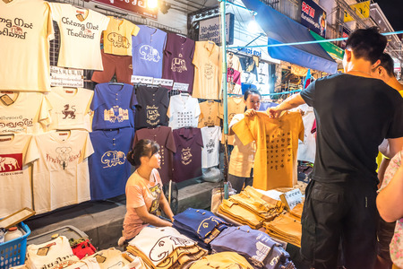 CHIANG MAI,THAILAND - AUGUST 08 : Tourists shopping souvenirs at famous Saturday walking street market Wualai on August 08, 2015 in Chiang Mai, Thailand. Market is opened every Saturday from 4pm till midnight.のeditorial素材
