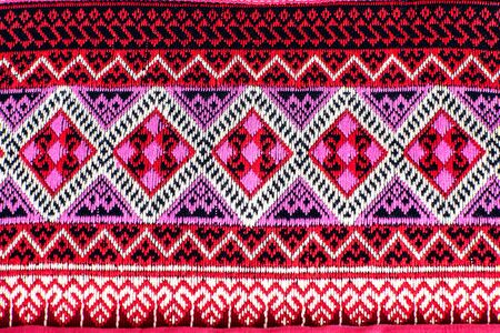 Closeup traditional thai sarong pattern (sarong Teenjok) for a background.の写真素材