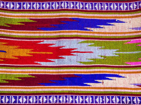 Closeup traditional thai sarong pattern for a background.の写真素材