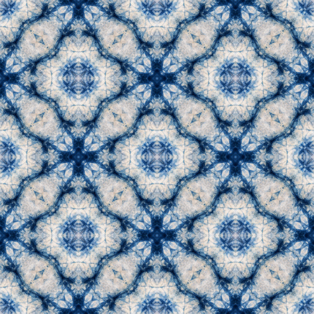 Abstract background pattern made from tie dye fabric, endless pattern for wallpaper.の写真素材