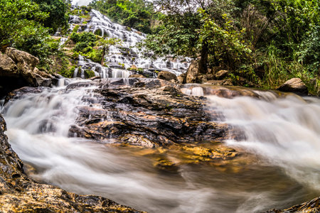 Mae Ya waterfall in Doi Inthanon National Park,Thailand,Most Famous in Thailand, Beautiful silky waterfall flow through stones.の写真素材