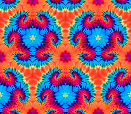 Abstract background pattern made from tie dye fabric,  kaleidoscope  pattern, endless pattern for wallpaper.の写真素材