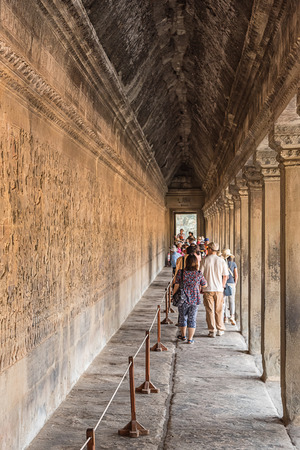 SIEM REAP, CAMBODIA - MARCH 08: Tourists visitors Angkor Wat is the country's prime attraction, is the largest Hindu temple and religious monument in the world  on March 08, 2016 Siem Reap, Cambodia.のeditorial素材