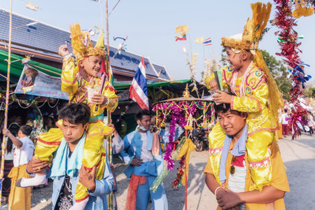 CHIANG MAI, THAILAND - MARCH 18 : Poy Sang Long festival, A Ceremony of boys to become novice monk, In parade around Koo Maan temple on March 18, 2016 in Chiang mai, Thailand.のeditorial素材