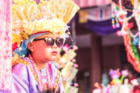 CHIANG MAI, THAILAND - MARCH 18 : Poy Sang Long festival, A Ceremony of boys to become novice monk, In parade around Koo Maan temple on March 18, 2016 in Chiang mai, Thailand.のeditorial素材