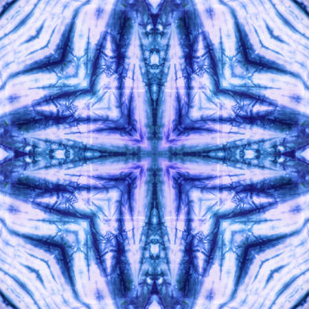 Abstract kaleidoscope or endless pattern made from tie dye fabric for background used.の写真素材